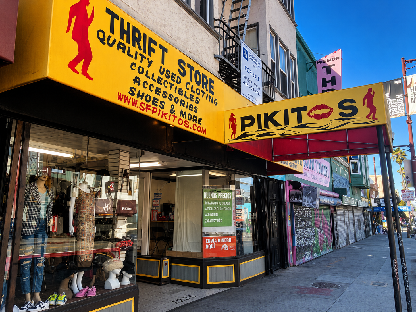 Racks of colorful vintage clothing inside Pikitos